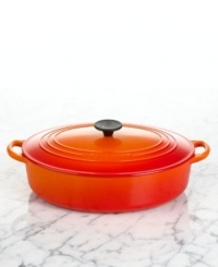 Also known as a Dutch oven, this versatile vessel is ideal for fork-tender dinners cooked slowly over low heat. The handsome enameled cast iron surface is resilient and retains heat like no other metal, making it perfect for oven-to-table serving. Limited lifetime warranty. Also known as a Dutch oven, this versatile vessel is ideal for fork-tender dinners cooked slowly over low heat. The handsome enameled cast iron surface is resilient and retains heat like no other metal, making it perfect for oven-to-table serving. Limited lifetime warranty.