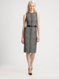 Textural wool tweed, tailored with exposed vertical seaming and accented with a leather belt.Jewel necklineSleevelessContrast pipingReverse exposed seamsIncluded leather beltBack ventConcealed back zipAbout 28 from natural waist98% viscose/2% elastaneDry cleanMade in ItalyModel shown is 5'10 (177cm) wearing US size 4. Textural wool tweed, tailored with exposed vertical seaming and accented with a leather belt.Jewel necklineSleevelessContrast pipingReverse exposed seamsIncluded leather beltBack ventConcealed back zipAbout 28 from natural waist98% viscose/2% elastaneDry cleanMade in ItalyModel shown is 5'10 (177cm) wearing US size 4.