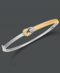 This Everlon bracelet will add a touch of elegance every time you slip it comfortably over your wrist. Bracelet features a single diamond (1/7 ct. t.w.) set in 14k gold and sterling silver. Approximate diameter: 2-1/2 inches. This Everlon bracelet will add a touch of elegance every time you slip it comfortably over your wrist. Bracelet features a single diamond (1/7 ct. t.w.) set in 14k gold and sterling silver. Approximate diameter: 2-1/2 inches.
