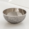 The grand form of a mythical dragon was the muse behind this sculptural nut bowl from Natori. It's artfully hand cast to capture a rich reptile-inspired texture.