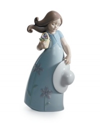 Little Violet wears a flower-print dress to match her basket of blooms in this darling collectible, handcrafted in Lladro porcelain. Little Violet wears a flower-print dress to match her basket of blooms in this darling collectible, handcrafted in Lladro porcelain.