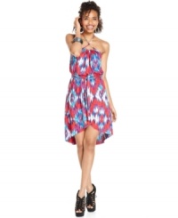 An abstract tribal-print adds serious color magic to this wrap-style halter dress from Eyeshadow! An abstract tribal-print adds serious color magic to this wrap-style halter dress from Eyeshadow!