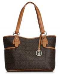 Whether you're strolling through a farmer's market or rushing off to work, this essential carryall by Giani Bernin is an excellent choice. Signature GBs and silver-tone hardware add interesting contrast, while plenty of pockets organize the interior. Whether you're strolling through a farmer's market or rushing off to work, this essential carryall by Giani Bernin is an excellent choice. Signature GBs and silver-tone hardware add interesting contrast, while plenty of pockets organize the interior.