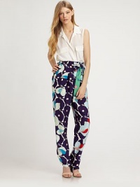 Vibrant florals highlight these sophisticated silk trousers tailored with a high-waist and sleek tapered leg.High waistSelf-beltPleated frontSlash pocketsBack darts below waistRise, about 15½Inseam, about 3495% silk/5% LycraDry clean ImportedModel shown is 5'10 (177cm) wearing US size 4.OUR FIT MODEL RECOMMENDS ordering true size. Vibrant florals highlight these sophisticated silk trousers tailored with a high-waist and sleek tapered leg.High waistSelf-beltPleated frontSlash pocketsBack darts below waistRise, about 15½Inseam, about 3495% silk/5% LycraDry clean ImportedModel shown is 5'10 (177cm) wearing US size 4.OUR FIT MODEL RECOMMENDS ordering true size.