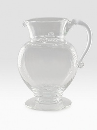 A simply stunning glass pitcher marries a traditional silhouette with a spiraled sphere ground. Extraordinary thread and berry detail creates all the interest and charm of an heirloom classic. 76 oz. capacity 9½H X 7½ diam. Dishwasher safe Imported A simply stunning glass pitcher marries a traditional silhouette with a spiraled sphere ground. Extraordinary thread and berry detail creates all the interest and charm of an heirloom classic. 76 oz. capacity 9½H X 7½ diam. Dishwasher safe Imported