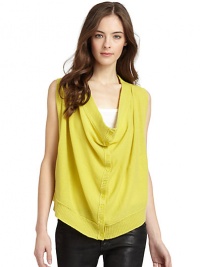 THE LOOKCowlneckSleeveless with ribbed armholes Front button closureSide seam pocketsRibbed asymmetrical hemBack seam detailsTHE FITAbout 25 from shoulder to hemTHE MATERIALCashmereCARE & ORIGINDry cleanImportedModel shown is 5'10 (177cm) wearing US size Small. THE LOOKCowlneckSleeveless with ribbed armholes Front button closureSide seam pocketsRibbed asymmetrical hemBack seam detailsTHE FITAbout 25 from shoulder to hemTHE MATERIALCashmereCARE & ORIGINDry cleanImportedModel shown is 5'10 (177cm) wearing US size Small.