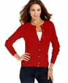 Lend instant elegance to your casual looks with Debbie Morgan's plus size cardigan, featuring decorative pearl buttons.