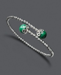 Your sense of style will make others green with envy. This chic, wrapped cuff features a sterling silver sparkle bead setting accented with malachite (10-3/4 ct. tw.) ends. Approximate length: 7-1/2 inches. Your sense of style will make others green with envy. This chic, wrapped cuff features a sterling silver sparkle bead setting accented with malachite (10-3/4 ct. tw.) ends. Approximate length: 7-1/2 inches.