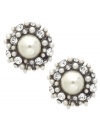 A pair of stud earrings from Bar III bursting with intrigue. Imitation pearls are surrounded by shimmering crystal accents. Crafted in gold tone mixed metal. Approximate diameter: 1 inch.