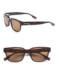 A full-rim design featuring a rich tortoiseshell pattern and a temple logo detail.AcetateBrown polarized lens100% UV protectiveImported A full-rim design featuring a rich tortoiseshell pattern and a temple logo detail.AcetateBrown polarized lens100% UV protectiveImported