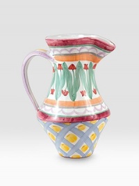 A handcrafted ceramic design inspired by a trip to a Dutch tulip market is individually painted by master ceramics artisans in an array blossoms and bold lines. For an especially one-of-a kind touch, each piece bears the hand-placed stamps of the artisans who created it. Dishwasher- and microwave-safe Six-ounce capacity 10H X 6¼ diam. Made in USA A handcrafted ceramic design inspired by a trip to a Dutch tulip market is individually painted by master ceramics artisans in an array blossoms and bold lines. For an especially one-of-a kind touch, each piece bears the hand-placed stamps of the artisans who created it. Dishwasher- and microwave-safe Six-ounce capacity 10H X 6¼ diam. Made in USA
