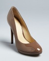 B Brian Atwood delivers his patent brand of style perfection in these must-buy almond toe platform pumps.