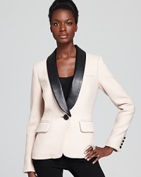 A key piece this season, Milly's sharp tuxedo jacket boasts tough-luxe with a bold leather collar for a modern take on an iconic style. A key piece this season, Milly's sharp tuxedo jacket boasts tough-luxe with a bold leather collar for a modern take on an iconic style.