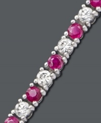 A classic tennis bracelet with an extra hint of vibrance. Sparkling round-cut white sapphires (2-3/4 ct. t.w.) and rubies (2-1/2 ct. t.w.) combine in a polished sterling silver setting. Approximate length: 7 inches. A classic tennis bracelet with an extra hint of vibrance. Sparkling round-cut white sapphires (2-3/4 ct. t.w.) and rubies (2-1/2 ct. t.w.) combine in a polished sterling silver setting. Approximate length: 7 inches.