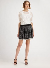 Ruffled silk skirt in an ultra-short silhouette with an elastic waistband and contrasting, semi-sheer overlay. Elastic waistbandSemi-sheer overlayFully linedAbout 18 longSilkDry cleanImported of Italian fabricModel shown is 5'10 (177cm) wearing US size Small. Ruffled silk skirt in an ultra-short silhouette with an elastic waistband and contrasting, semi-sheer overlay. Elastic waistbandSemi-sheer overlayFully linedAbout 18 longSilkDry cleanImported of Italian fabricModel shown is 5'10 (177cm) wearing US size Small.