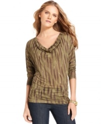 This sleek cowl-neck top from MICHAEL Michael Kors features an earth-tone feather print and is the perfect way to update your favorite denim. This sleek cowl-neck top from MICHAEL Michael Kors features an earth-tone feather print and is the perfect way to update your favorite denim.