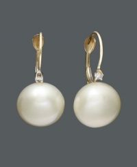 There's nothing more elegant than pearls with a hint of diamond. These cultured freshwater pearl drops (10-1/2 - 11 mm) with round-cut diamond (1/3 ct. t.w.) are a gift she will cherish for a lifetime. Earrings crafted in 14k gold. Approximate drop: 3/4 inch. There's nothing more elegant than pearls with a hint of diamond. These cultured freshwater pearl drops (10-1/2 - 11 mm) with round-cut diamond (1/3 ct. t.w.) are a gift she will cherish for a lifetime. Earrings crafted in 14k gold. Approximate drop: 3/4 inch.