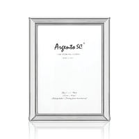 Timeless and refined, this sterling silver frame makes an exceptional gift, even if it's for yourself. Use it to frame your favorite photos or to display a special invitation. Timeless and refined, this sterling silver frame makes an exceptional gift, even if it's for yourself. Use it to frame your favorite photos or to display a special invitation.