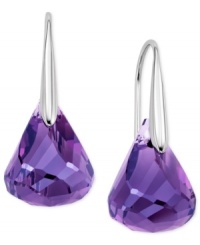 Amazing amethysts. Purple reigns in this pair of drop earrings from Swarovski. Crafted from rhodium-plated mixed metal and featuring stunning amethysts offset with crystal accents, this set is a thing of beauty. Approximate drop: 1-1/10 inches. Amazing amethysts. Purple reigns in this pair of drop earrings from Swarovski. Crafted from rhodium-plated mixed metal and featuring stunning amethysts offset with crystal accents, this set is a thing of beauty. Approximate drop: 1-1/10 inches.