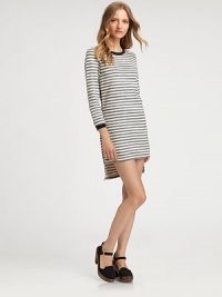 Your favorite striped tee, elongated in an effortless shift that's as versatile as the wearer.JewelneckLong sleevesFlat frontHem longer in backAbout 19 from natural waistCottonDry cleanImportedModel shown is 5'10 (177cm) wearing US size Small. Your favorite striped tee, elongated in an effortless shift that's as versatile as the wearer.JewelneckLong sleevesFlat frontHem longer in backAbout 19 from natural waistCottonDry cleanImportedModel shown is 5'10 (177cm) wearing US size Small.