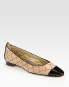 Timeless flat updated by a natural cork upper, contrasting patent leather trim and decorative stitching that forms a classic quilted pattern. Cork and patent leather upperCanvas liningLeather solePadded insoleMade in ItalyOUR FIT MODEL RECOMMENDS ordering one size up as this style runs small. 