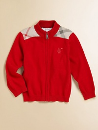 Both a sweater and a light jacket, this cotton cardigan is all Burberry, with checked knit patches at the shoulders and a cozy zip-up front.Ribbed mock turtleneckCheck shoulder patchesZip frontEmbroidered chest logoLong sleeves with ribbed cuffsRibbed hemCottonHand washImported Both a sweater and a light jacket, this cotton cardigan is all Burberry, with checked knit patches at the shoulders and a cozy zip-up front.Ribbed mock turtleneckCheck shoulder patchesZip frontEmbroidered chest logoLong sleeves with ribbed cuffsRibbed hemCottonHand washImported