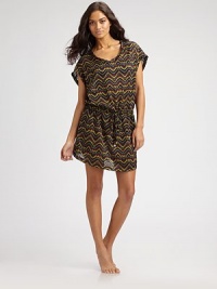 Comfortable fit combined with a charming, exotic print makes for a must-have seasonal look. V-neckShort sleevesDrawstring waist with gold accents57% polyamide/27% polyester/16% spandexHand washImported Comfortable fit combined with a charming, exotic print makes for a must-have seasonal look. V-neckShort sleevesDrawstring waist with gold accents57% polyamide/27% polyester/16% spandexHand washImported
