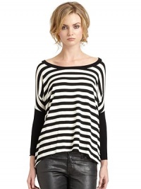THE LOOKStriped designRoundneckLong dolman sleeves Hi-lo unfinished hemTHE FITAbout 33 from shoulder to hemTHE MATERIALRayon/spandexCARE & ORIGINDry cleanMade in USAModel shown is 5'10 (177cm) wearing US size Small. THE LOOKStriped designRoundneckLong dolman sleeves Hi-lo unfinished hemTHE FITAbout 33 from shoulder to hemTHE MATERIALRayon/spandexCARE & ORIGINDry cleanMade in USAModel shown is 5'10 (177cm) wearing US size Small.