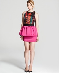 Flaunt your curves in this brightly-colored Milly dress that features a party-poised peplum skirt and a flattering banded waist for a cinched silhouette. Flaunt your curves in this brightly-colored Milly dress that features a party-poised peplum skirt and a flattering banded waist for a cinched silhouette.