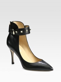 Head-turning leather silhouette with a classic point toe, adjustable ankle strap and gleaming metal studs. Self-covered heel, 3½ (90mm)Leather upper with metal studs on adjustable buckle strapPoint toeBack zipLeather lining and solePadded insoleMade in ItalyOUR FIT MODEL RECOMMENDS ordering true size. Head-turning leather silhouette with a classic point toe, adjustable ankle strap and gleaming metal studs. Self-covered heel, 3½ (90mm)Leather upper with metal studs on adjustable buckle strapPoint toeBack zipLeather lining and solePadded insoleMade in ItalyOUR FIT MODEL RECOMMENDS ordering true size.