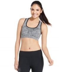 Ideology's space-dyed sports bra features a seamless design and punchy print for expert athletic style. Ideology's space-dyed sports bra features a seamless design and punchy print for expert athletic style.