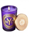 From a uniquely New York collection of scents, this intoxicating scented candle celebrates the legendary history of Harlem.  · Blend of lavender, cedarwood, coffee, vanilla, patchouli  · Made of the finest wax and wicks  · In sturdy, tinted glass container  · Gilt metal cap keeps scent from fading 