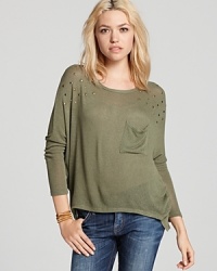 Bedecked with shoulder studs, this Vintage Havana sweater is an edgy fashionista's turn-to companion for the chilly winter season. Bedecked with shoulder studs, this Vintage Havana sweater is an edgy fashionista's turn-to companion for the chilly winter season.