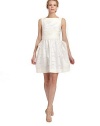 Rich floral jacquard sheath with tonal inserts and a structured pocket skirt, evokes charm and character.Bateau neckline Sleeveless Dual tonal bands at bodice Full skirt with structured side pockets Side zipper Fully lined About 35½ from shoulder to hem 55% polyamide/45% polyester Dry clean Imported