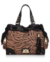 Take on the exotic trend with this tiger-print tote from Juicy Couture. Featuring luxe leather handles, golden stud accents and flirty side bows, it's easy to see why this look is so purr-fect. Take on the exotic trend with this tiger-print tote from Juicy Couture. Featuring luxe leather handles, golden stud accents and flirty side bows, it's easy to see why this look is so purr-fect.