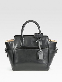 A petite design in supple leather with a removable zipper pouch.Double top handles, 4 dropDetachable adjustable shoulder strap, 21-22½ dropTop zip closureThree outside open pocketsOne detachable zip pouchOne inside zip pocketTwo inside open pockets9¾W X 9½H X 4¾DImported A petite design in supple leather with a removable zipper pouch.Double top handles, 4 dropDetachable adjustable shoulder strap, 21-22½ dropTop zip closureThree outside open pocketsOne detachable zip pouchOne inside zip pocketTwo inside open pockets9¾W X 9½H X 4¾DImported