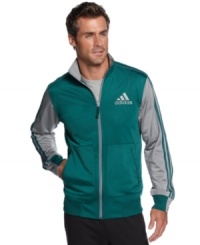 Take it on the run. This adidas track jacket with ClimaLite technology keeps you dry and comfortable, making it the perfect companion when you're ready to get moving. Take it on the run. This adidas track jacket with ClimaLite technology keeps you dry and comfortable, making it the perfect companion when you're ready to get moving.