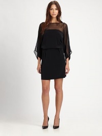 Semi-sheer paneling and dolman sleeves add a sultry spin to this exquisite, silk-trimmed silhouette. BoatneckSemi-sheer panelingThree-quarter dolman sleevesElastic waistbandBack keyhole closureAbout 18 from natural waistFully linedBody: TriacetateTrim: SilkDry cleanImportedModel shown is 5'9½ (176cm) wearing US size Small. Semi-sheer paneling and dolman sleeves add a sultry spin to this exquisite, silk-trimmed silhouette. BoatneckSemi-sheer panelingThree-quarter dolman sleevesElastic waistbandBack keyhole closureAbout 18 from natural waistFully linedBody: TriacetateTrim: SilkDry cleanImportedModel shown is 5'9½ (176cm) wearing US size Small.