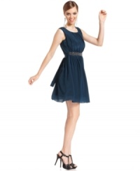 A beaded waistband adds sparkle and shine to this MM Couture dress for a flirty fete-ready look! A beaded waistband adds sparkle and shine to this MM Couture dress for a flirty fete-ready look!