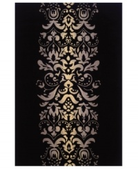 Play with patterns! Wake up your decor with Momeni's irresistibly contemporary rug. A vintage-inspired motif of plumes and blooms adorns this black wool rug, hand-tufted for texture and superior softness. Play with patterns! Wake up your decor with Momeni's irresistibly contemporary rug. A vintage-inspired motif of plumes and blooms adorns this black wool rug, hand-tufted for texture and superior softness.