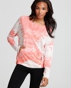 A pop-bright tie-dye print elevates this laid-back Hard Tail sweatshirt to high style.
