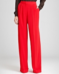 Wow the crowd in a red haute pair of REISS trousers. Add sky-high heels, and these pleated wide leg pants will elongate legs above and beyond. Wow the crowd in a red haute pair of REISS trousers. Add sky-high heels, and these pleated wide leg pants will elongate legs above and beyond.