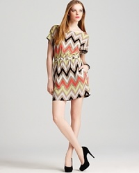 More than meets the eye, this BCBGeneration tribal print dress boasts subtle details like relaxed pockets and a flirty cutout concealed at the back waistline. More than meets the eye, this BCBGeneration tribal print dress boasts subtle details like relaxed pockets and a flirty cutout concealed at the back waistline.
