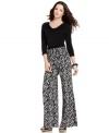 NY Collection's wide-leg pants make a stylish statement with a bold print and fashion-forward silhouette. (Clearance)