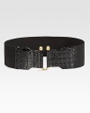 A cinching style in crocodile embossed leather and stretchy elastic with goldtone hardware. Width, about 3Imported 