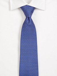 A lively addition to any work wardrobe, handsomely woven in golf-printed Italian silk.SilkDry cleanMade in Italy