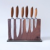 German stainless steel harmonizes with Asian teak wood on this superior set of knives from Schmidt Brothers for an aesthetically pleasing and exceptionally precise collection. This set includes a 6 Double Edge Utility Knife, 8 Chef Knife, 7 Boning Knife, 6 Petite Chef Knife, 4 Paring Knife, 9 Bread Knife and Downtown Block.