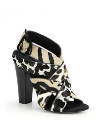 THE LOOKMixed animal printed haircalf straps crisscross on topAdjustable ankle strapBlock heelPadded insoleLeather block heel 4½ (115mm)THE MATERIALHaircalf upperLeather lining and soleORIGINMade in Italy THE LOOKMixed animal printed haircalf straps crisscross on topAdjustable ankle strapBlock heelPadded insoleLeather block heel 4½ (115mm)THE MATERIALHaircalf upperLeather lining and soleORIGINMade in Italy