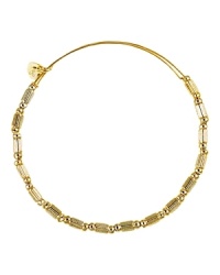 A flash of gleaming yellow gold plated beads lends subtle shine on a delicate, expandable Alex and Ani bracelet. A flash of gleaming yellow gold plated beads lends subtle shine on a delicate, expandable Alex and Ani bracelet.