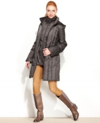 Vertical quilting makes Nautica's cozy down puffer look sleek and sophisticated -- without sacrificing warmth! Vertical quilting makes Nautica's cozy down puffer look sleek and sophisticated -- without sacrificing warmth!